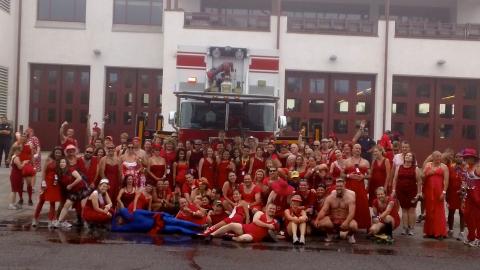 Group of hashers in Red Dresses at a Red Dress Run